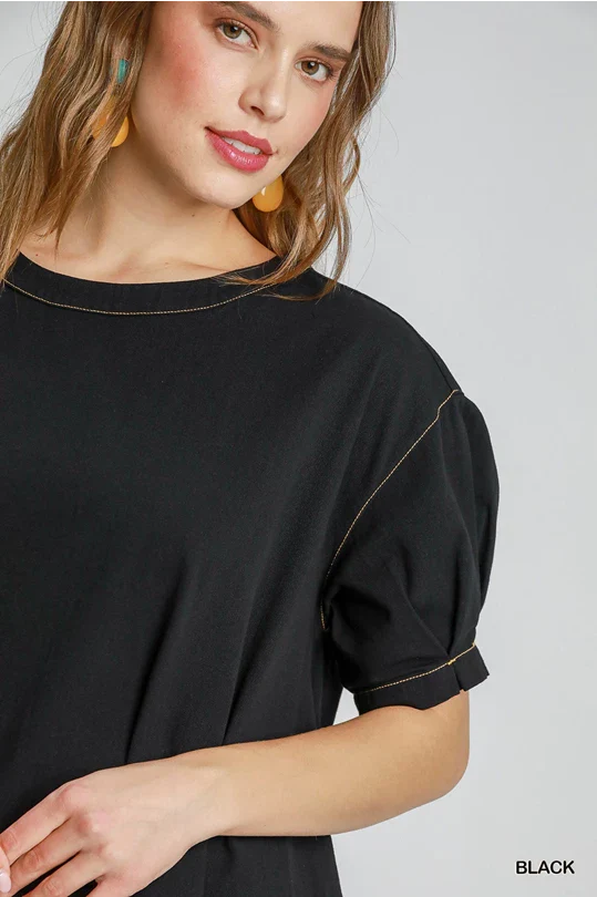 Black top with white stitching
